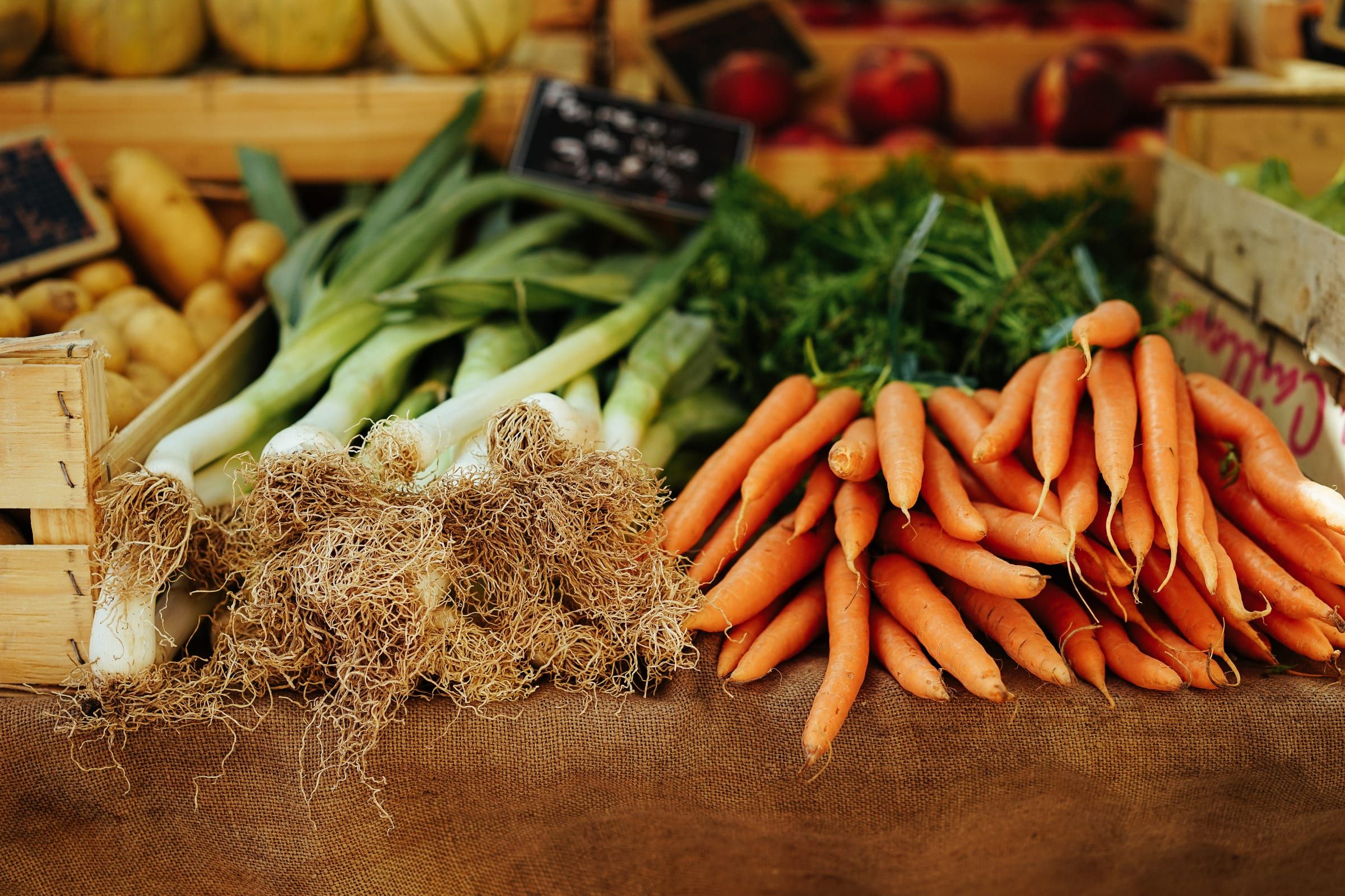 Bunches of leeks and carrots from the farm delivery